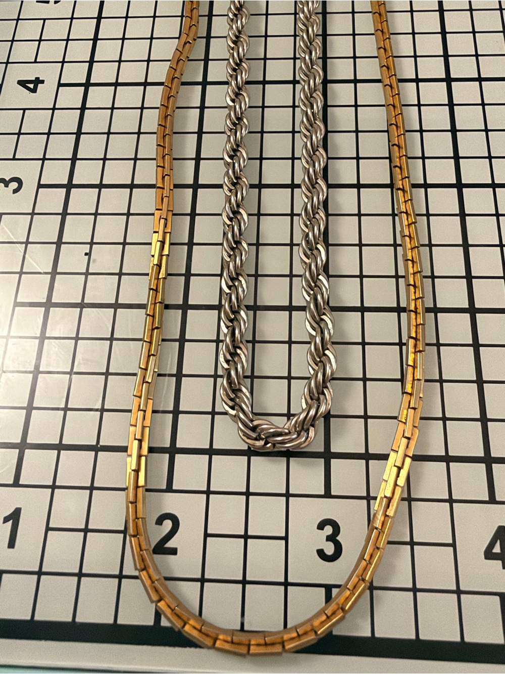 Two silver and gold tone Chain Necklaces